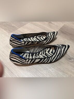 Rothy’s zebra print W8 flats